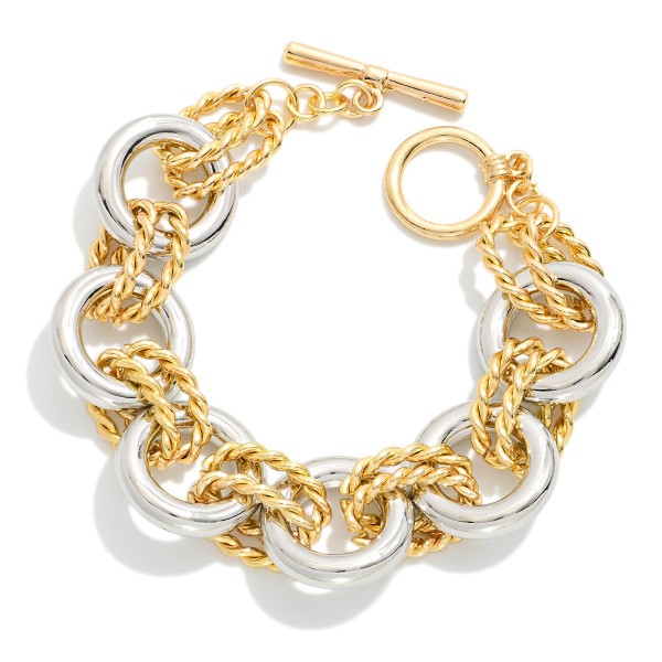 Two Tone Circle Chain Link Bracelet Featuring Twisted Oval Metal Links With Toggle Clasp 

- Approximately 4" D 