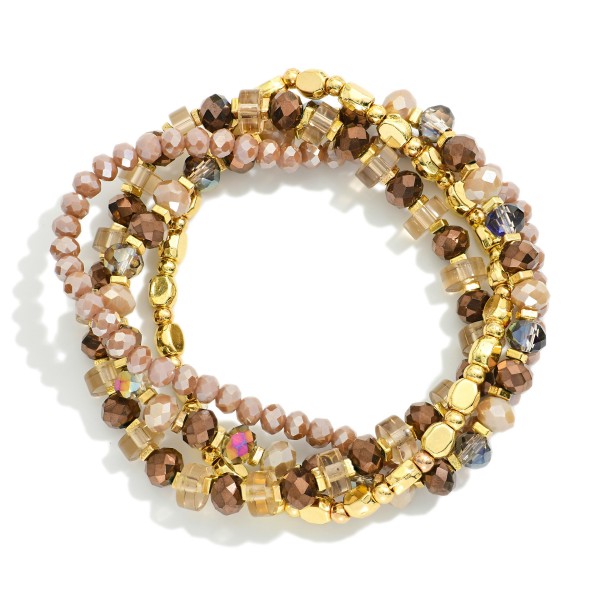 Set Of Four Beaded Stretch Bracelets Featuring Faceted Beads, Disks, & Metal Tones

- Approximately 3.25" D