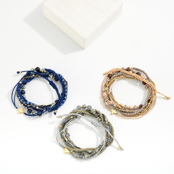 Set Of Six Stackable Bracelets Featuring Rope Plus Cross Bracelet, Heishi Beads, & Faceted Beads 

- Approximately 2.5" D