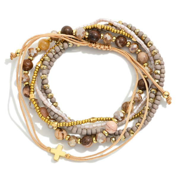 Set Of Six Stackable Bracelets Featuring Rope Plus Cross Bracelet, Heishi Beads, & Faceted Beads 

- Approximately 2.5" D