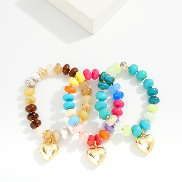 Rainbow Marbled Stone Bead Stretch Bracelet Featuring Metal Tone Puffy Heart 

- Approximately 3" D