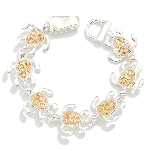 Linked Two Tone Metal Sea Turtles Bracelet 

- Approximately 3.5" D