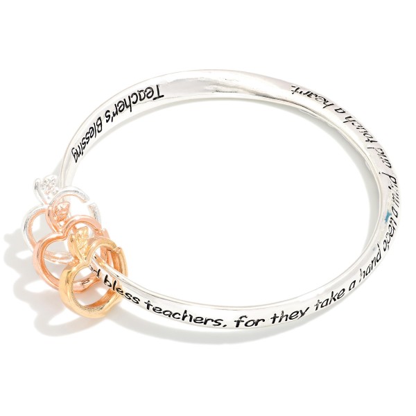 "Teacher's Blessing" Engraved Metal Tone Bangle Bracelet Featuring Apple Accents

- Approximately 2.5" D 
