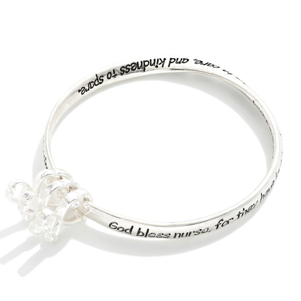 "Nurse's Blessing" Engraved Metal Tone Bangle Bracelet Featuring Stethoscope Accents

- Approximately 2.5" D 