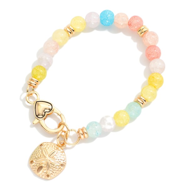 Cracked Bead Beaded Bracelet Featuring Metal Tone Sand Dollar Charm 

- Approximately 3" D