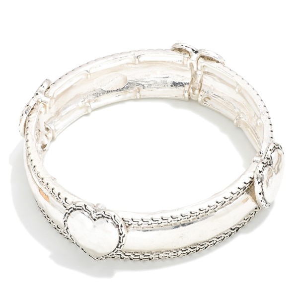 Hammered Metal Stretch Bangle Bracelet Featuring Heart Accents 

- Approximately 2.5" D