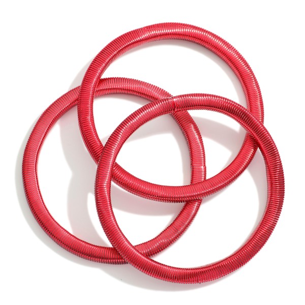 Set Of Three Christmas Metal Spring Stretch Bracelets 

- Approximately 2.25" D