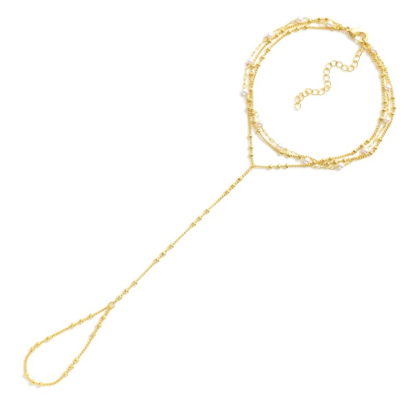 Layered Chain Link Hand Chain Bracelet Featuring Pearl Details 

- Approximately 3.5" D
- Extender 2" L 