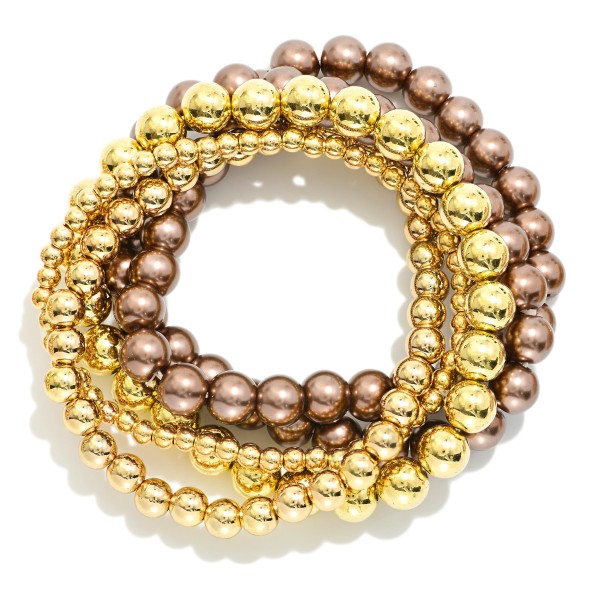 Set Of Five Beaded Stretch Bracelets Featuring Metal Tones & Metallic Beads

- Approximately 2.5" D 