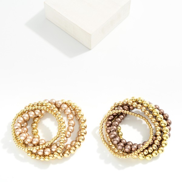 Set Of Five Beaded Stretch Bracelets Featuring Metal Tones & Metallic Beads

- Approximately 2.5" D 