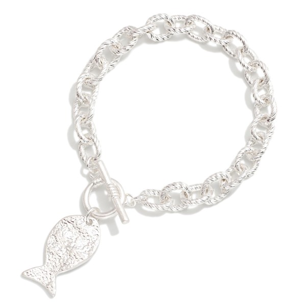 Twisted Metal Link Chain Link Bracelet Featuring Hammered Metal Fish Charm & Toggle Clasp

- Approximately 3.5" D