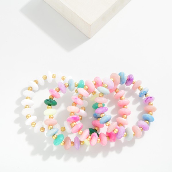 Candy Stone Beaded Stretch Bracelet Featuring Gold Tone Ball Stations 

- Approximately 3" D 