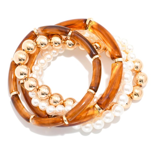 Set Of Five  Beaded Stretch Bracelets Featuring Pearls, Metal Tones, & Tube Beads 

- Approximately 2.5" D