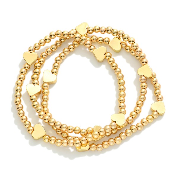 Set Of Three Beaded Stretch Bracelets Featuring Metal Tone Heart Stations 

- Approximately 2.5" D
