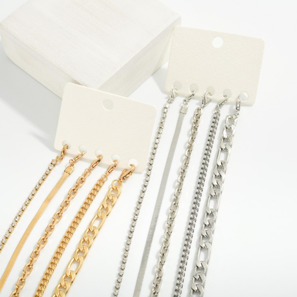 Set Of Five Chain Link & Rhinestone Bracelets 

- Approximately 3.5" D
- Extender 2" L