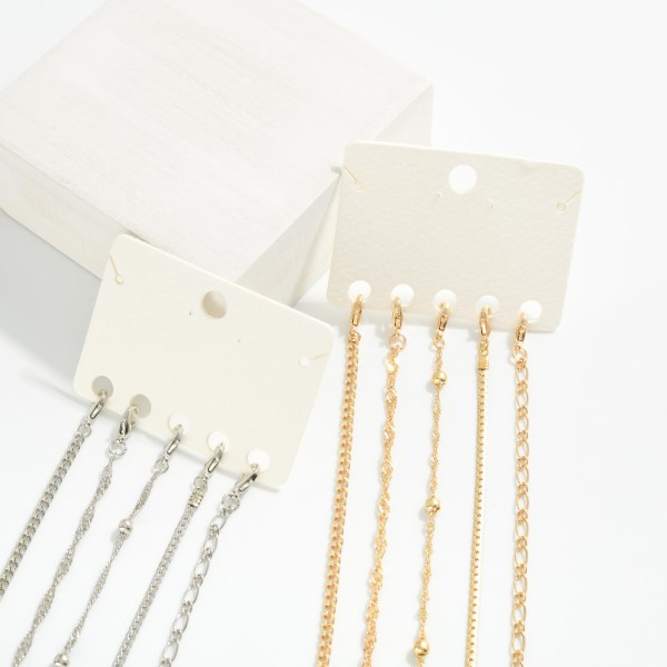 Set Of Five Chain Link Bracelets

- Approximately 3.25" D 
- Extender 2" L