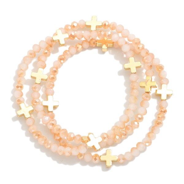 Set Of Three Faceted Bead Stretch Bracelets Featuring Metal Tone Plus Cross Stations 

- Approximately 2.5" D