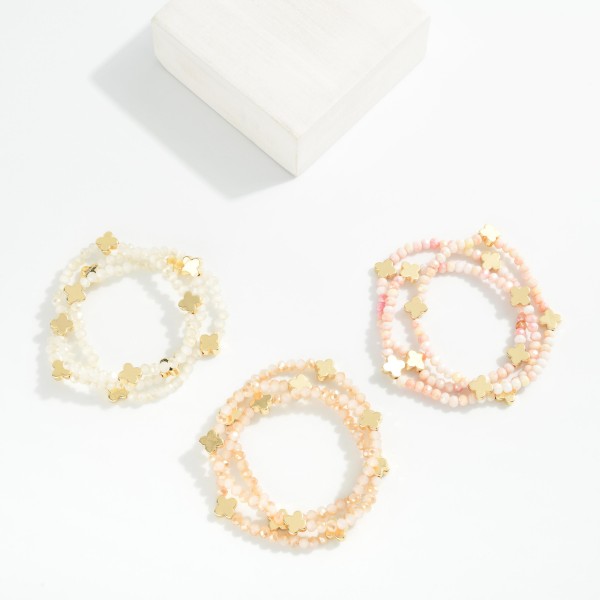 Set Of Three Faceted Bead Stretch Bracelets With Metal Tone Bubble Cross Stations 

- Approximately 2.5" D