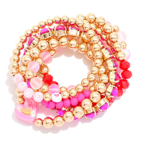 Set Of Six Beaded Streatch Bracelets Featuring Metal Tones, Faceted Beads, & Hearts 

- Approximately 3.75" D 