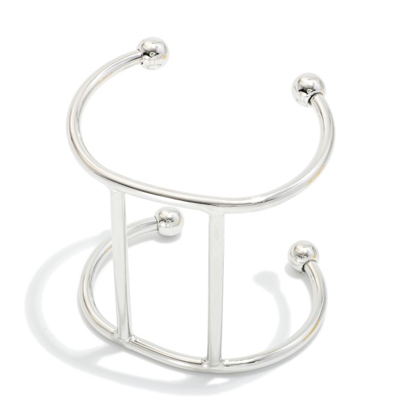 Metal Tone Open Cuff Bracelet 

- Approximately 2.25" D