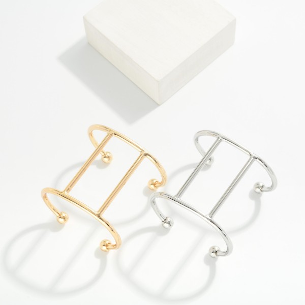 Metal Tone Open Cuff Bracelet 

- Approximately 2.25" D