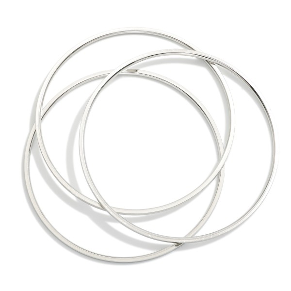 Simple Set Of Three Metal Tone Bangle Bracelet 

- Stainless Steel
- Water Resistant
- Approximately 2.75" D
