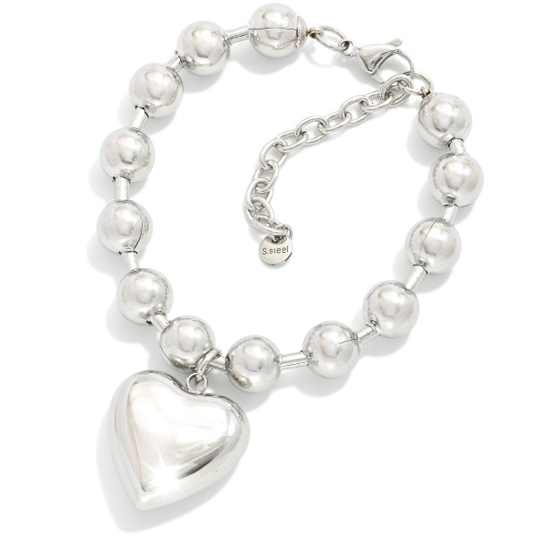 Chunky Metal Tone Beaded Bracelet Featuring Puffy Heart Detail 

- Stainless Steel
- Water Resistant
- Approximately 2.5" D