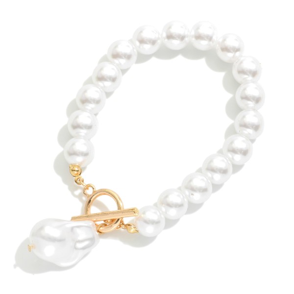 Pearl Beaded Bracelet With Baroque Pearl & Toggle Clasp 

- Approximately 2.5" D
