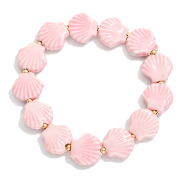Porcelain Shell Beaded Stretch Bracelet Featuring Gold Tones 

- Approximately 3" D 