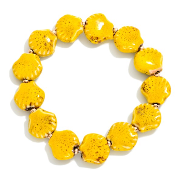 Porcelain Shell Beaded Stretch Bracelet Featuring Gold Tones 

- Approximately 3" D 