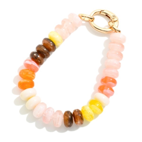 Marbled Acetate Disk Bead Bracelet With Hinged Clasp

- Approximately 2.5" D