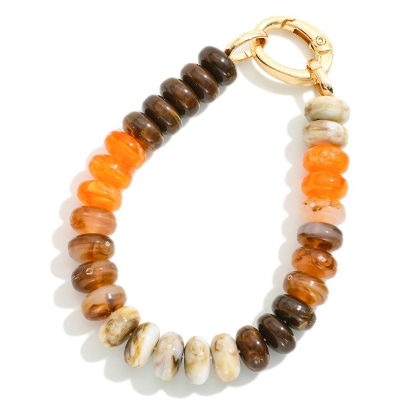 Marbled Acetate Disk Bead Bracelet With Hinged Clasp

- Approximately 2.5" D