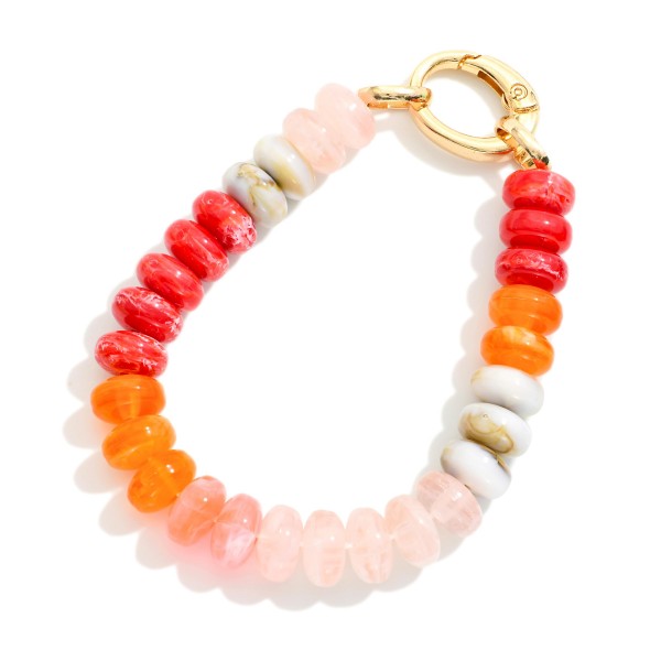 Marbled Acetate Disk Bead Bracelet With Hinged Clasp

- Approximately 2.5" D