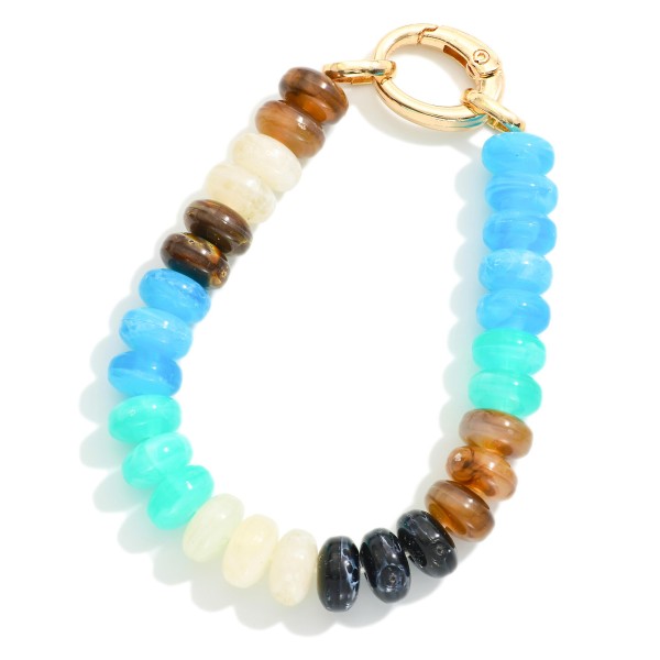 Marbled Acetate Disk Bead Bracelet With Hinged Clasp

- Approximately 2.5" D