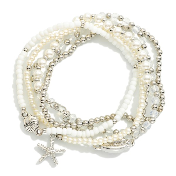 Set Of Five Beaded Stretch Bracelets Featuring Pearls, Metal Tones, & Metal Tone Sea Animal Charms 

- Approximately 2.5" D