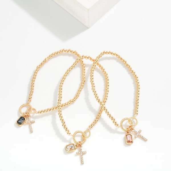 Metal Tone Beaded Stretch Bracelet Featuring Cross & Rhinestone Charms 

- Approximately 2.5" D