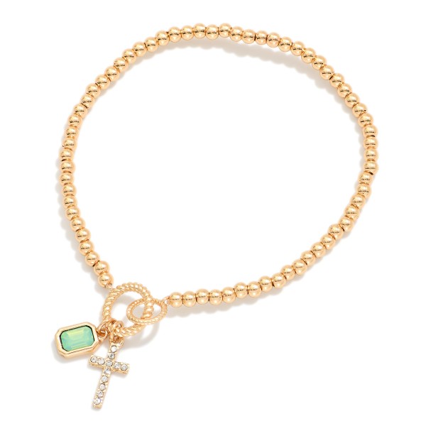 Metal Tone Beaded Stretch Bracelet Featuring Cross & Rhinestone Charms 

- Approximately 2.5" D