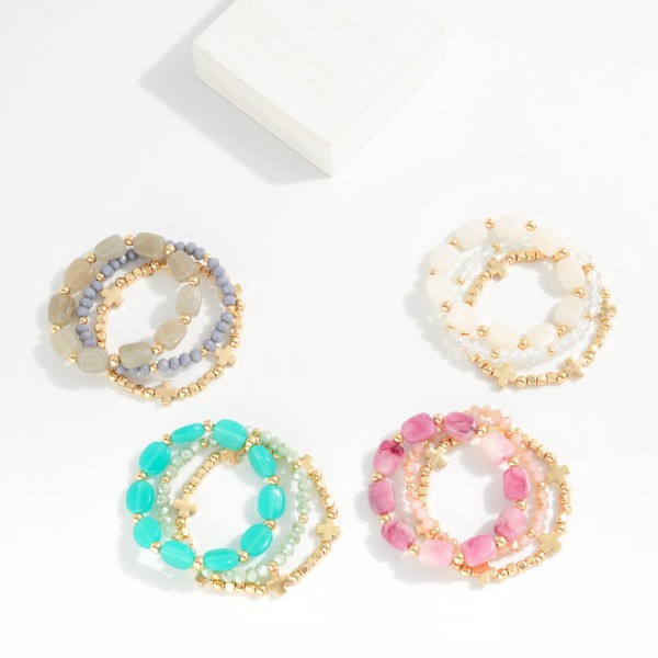 Set Of Three Beaded Stretch Bracelet Featuring Gold Tones, Stone, & Faceted Beads 

- Approximately 2.5" D 