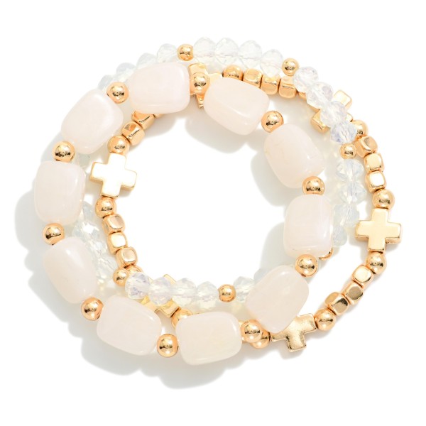 Set Of Three Beaded Stretch Bracelet Featuring Gold Tones, Plus Crosses, Stone, & Faceted Beads 

- Approximately 2.5" D 
