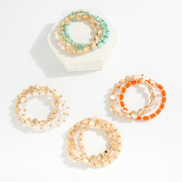 Set Of Three Beaded Stretch Bracelet Featuring Faceted Glass Beads & Gold Tones 

- Approximately 2.5" D 