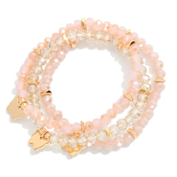 Set Of Three Faceted Class Bead Stretch Bracelet Featuring Gold Tones And Butterfly Charm 

- Approximately 2.5" D  