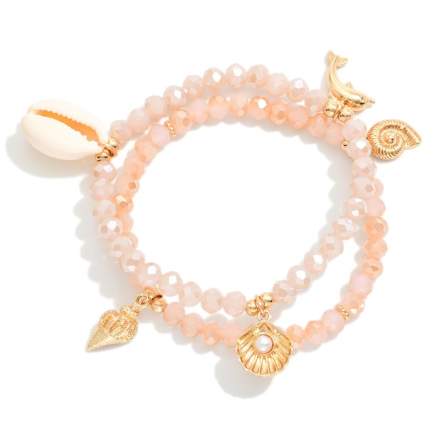 Set Of Two Beaded Stretch Bracelet Featuring Metal Tones & Beach Charms 

- Approximately 2.5" D