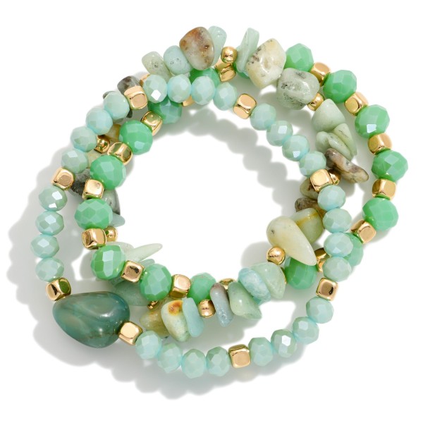 Set Of Three Faceted Beaded Stretch Bracelets Featuring Gold Tones & Stones 

- Approximately 3" D  