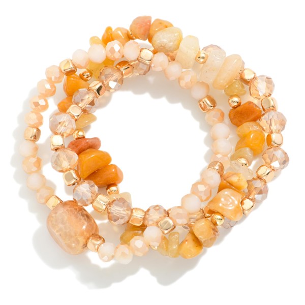 Set Of Three Faceted Beaded Stretch Bracelets Featuring Gold Tones & Stones 

- Approximately 3" D  