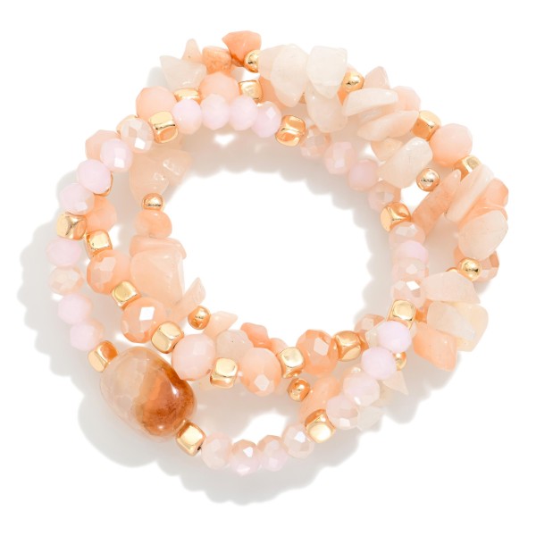Set Of Three Faceted Beaded Stretch Bracelets Featuring Gold Tones & Stones 

- Approximately 3" D  