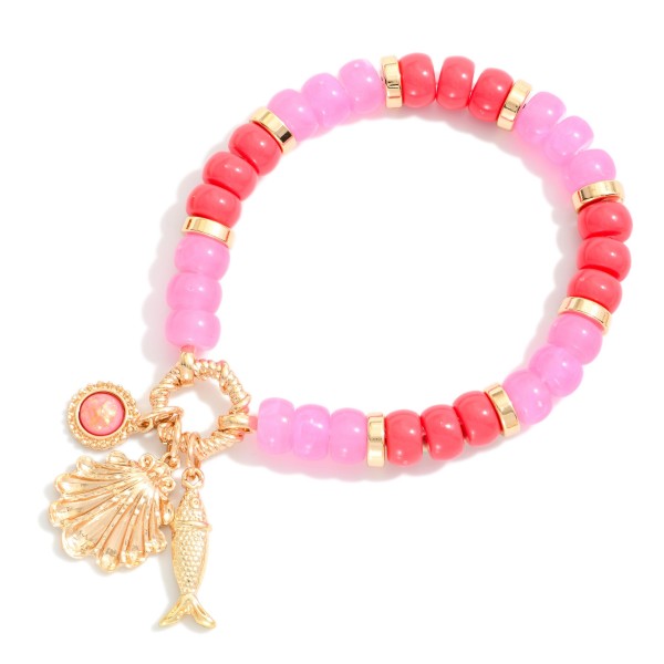Candy Stone Beaded Stretch Bracelet Featuring Metal Tone Beach Charms 

- Approximately 4" D
 