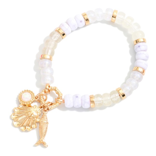 Candy Stone Beaded Stretch Bracelet Featuring Metal Tone Beach Charms 

- Approximately 4" D
 