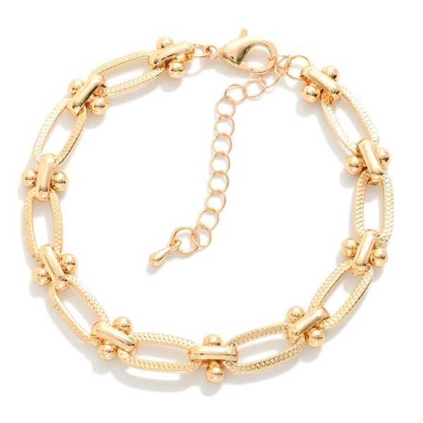 Metal Tone Textured Paperclip Chain Link Bracelet 

- Approximately 3" D 
- Extender 2" L 