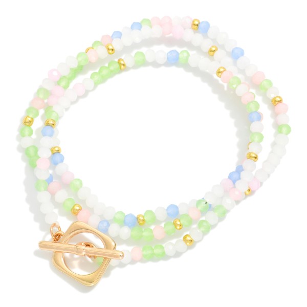 Set Of Three Faceted Bead Stretch Bracelets Featuring Gold Tones & Metal Toggle Clasp 

- Approximately 2.5" D 