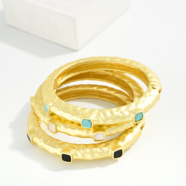 Hammered Metal Hinged Bangle Bracelet Featuring Stone Details

- Approximately 2.5" D